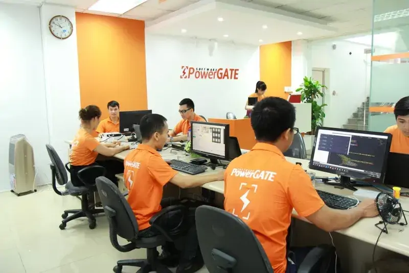 PowerGate Software’s development team collaborates in a dynamic and innovative workspace.