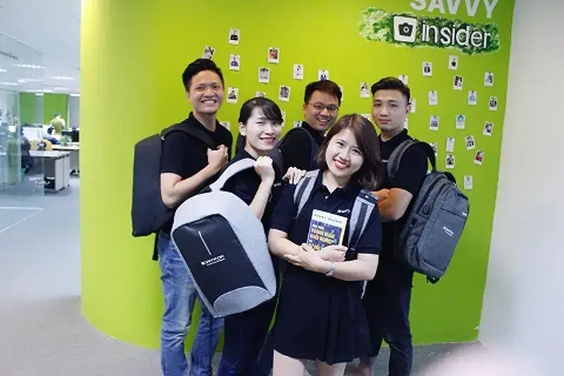 Young and energetic staff at Savvycom working offices, showing a youthful and lively environment in the technology industry.